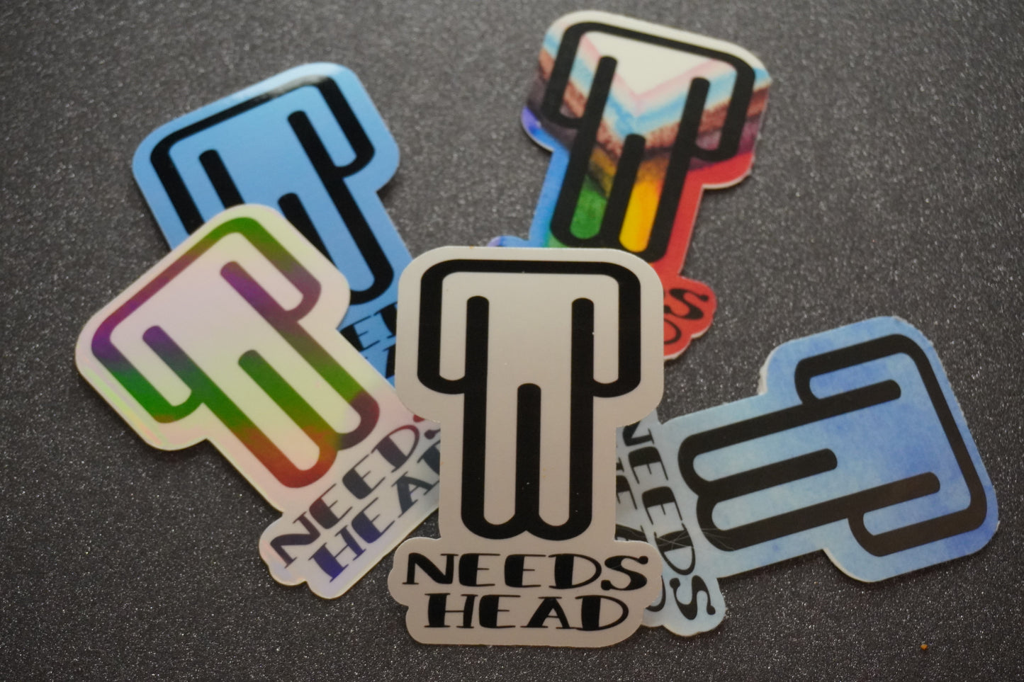 Man "Needs Head" Sticker