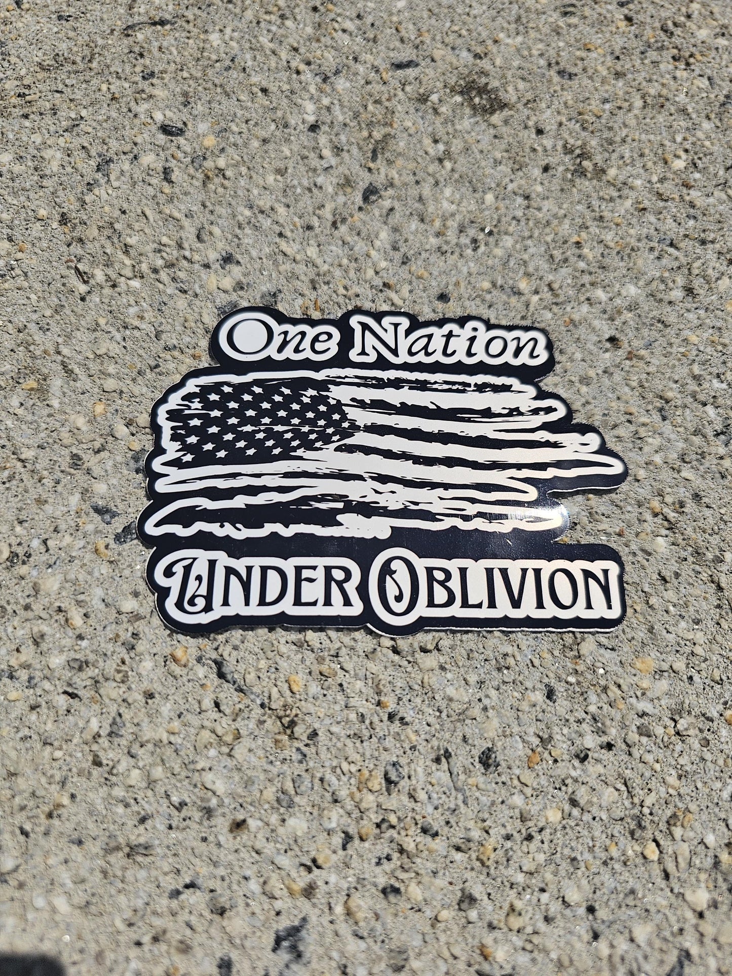One Nation Under Oblivion - Vinyl Sticker | Tattered American Flag | Edgy Patriotism with a Dose of Reality